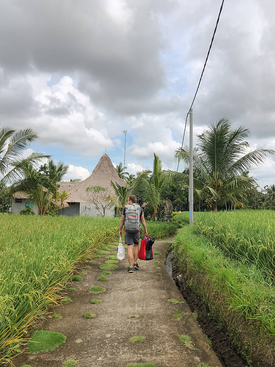 UGC travel, a man carrying bags and his luggage, Bali, Indonesia