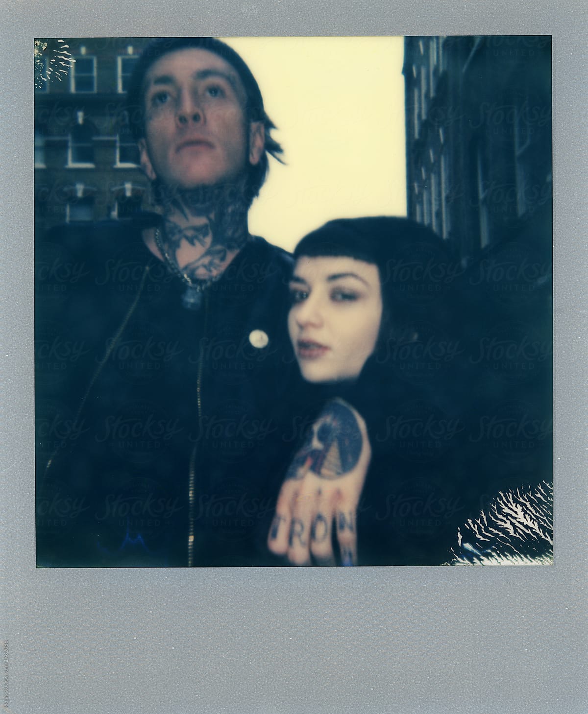 Polaroid of an unconventional gothic couple