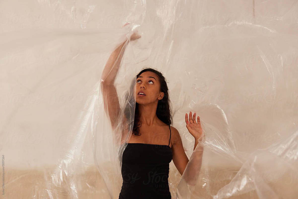 Young woman wrapping in film