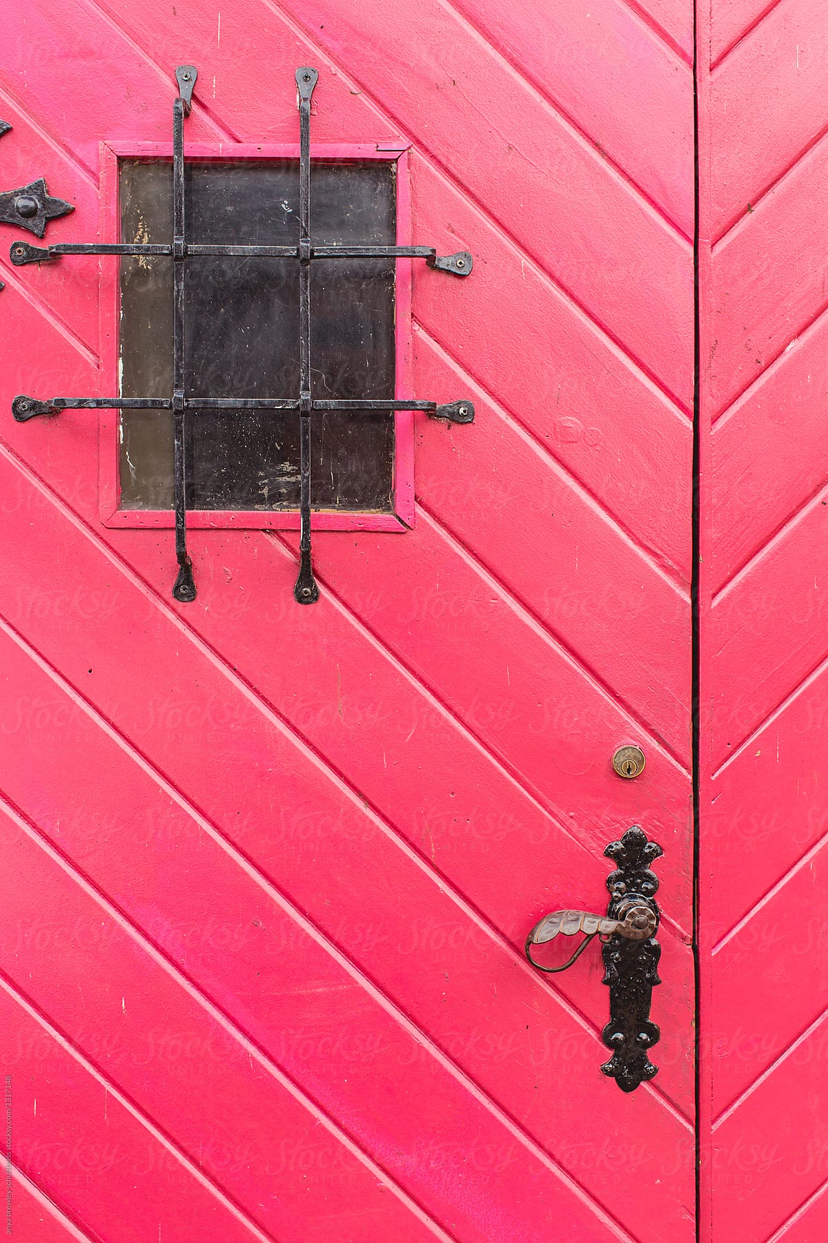 Vibrant antique red door and window