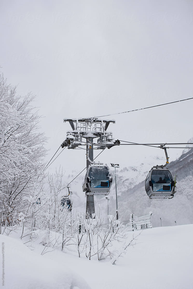 Cableway in snowy mountains in winter