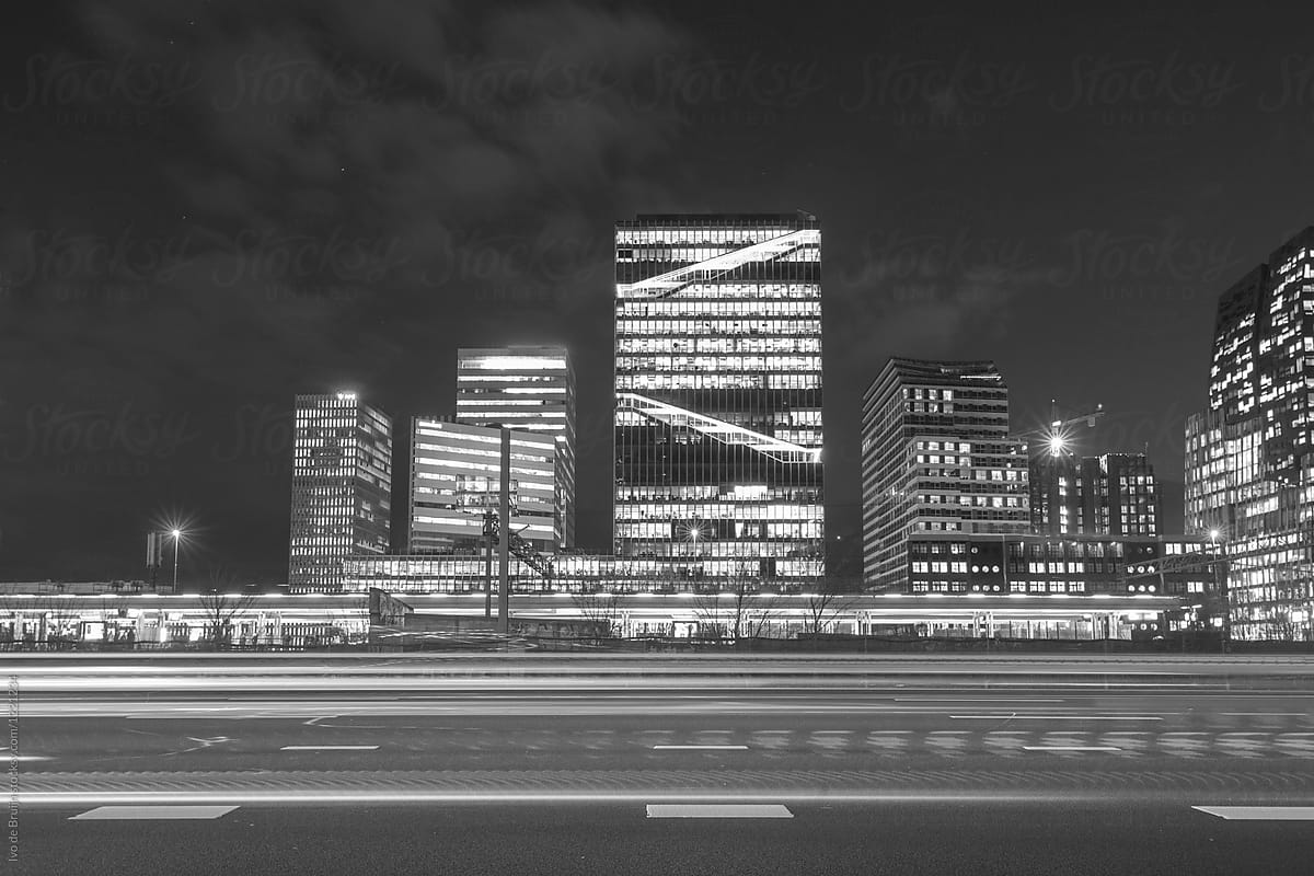 Amsterdam business district at night. With the highway in the front.