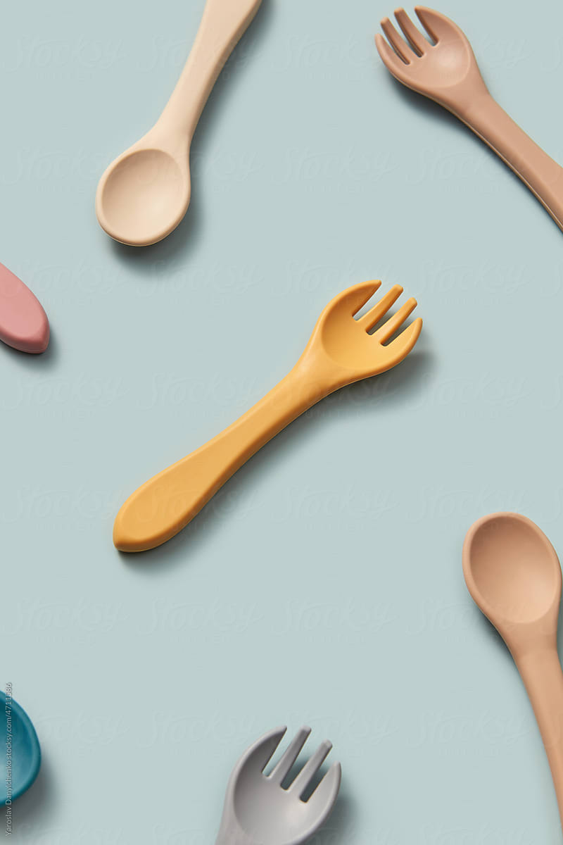 Cute baby dishware of small forks and spoons