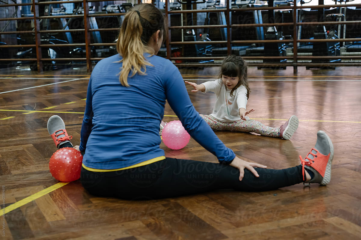 Mother And Daughter Playing In The Gym By Stocksy Contributor Luis Velasco Stocksy