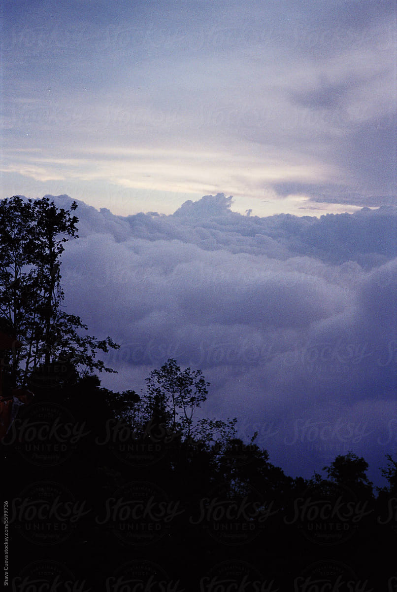 Film photography of a landscape of clouds over a mountain