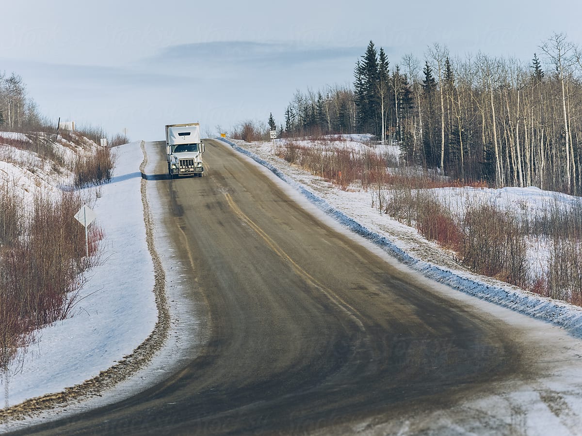 road with a heavy truck in winter in the eagle plains