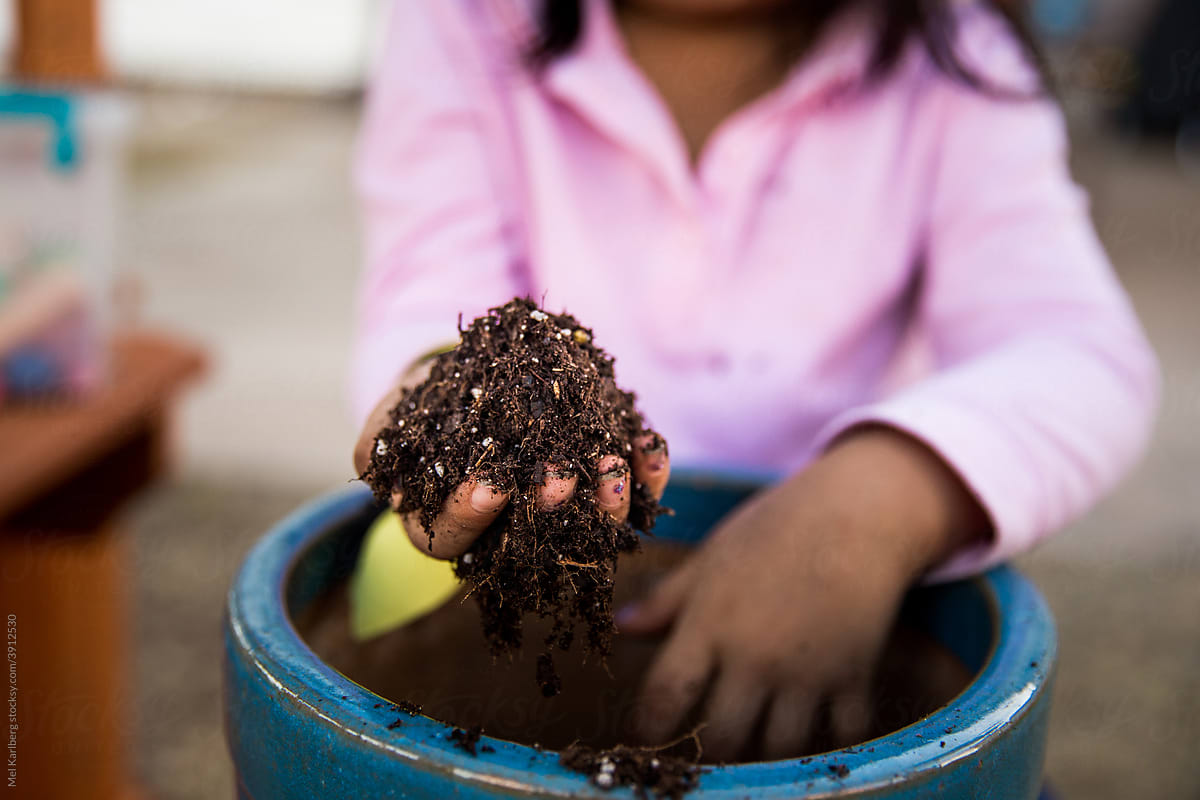 Girl playing in dirt