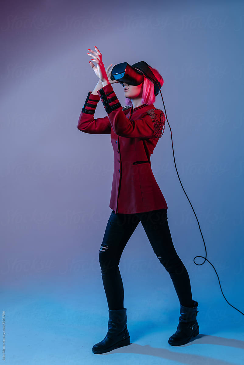 VR game girl plays in the color light