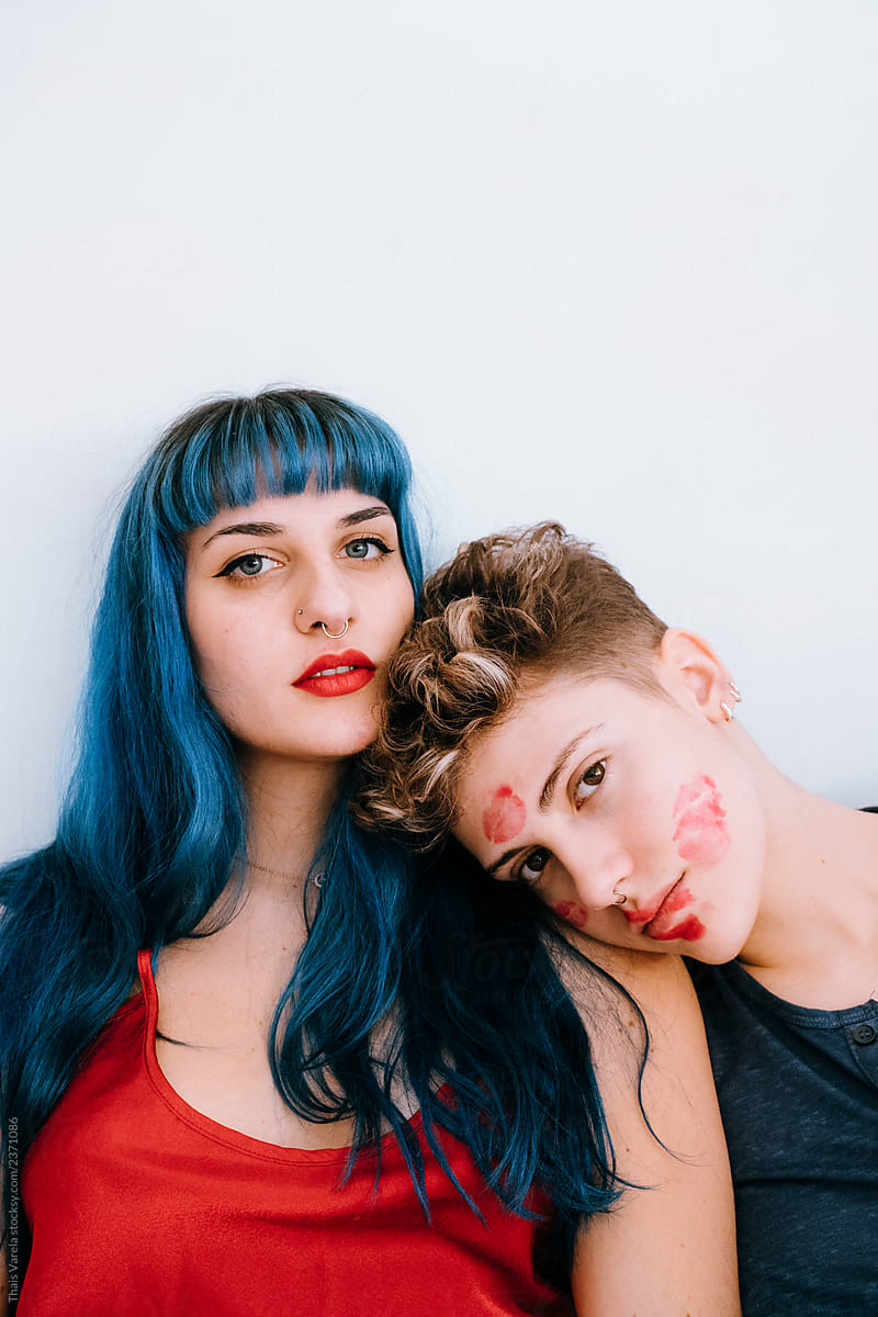 A Couple Of Lesbians In Bed Leave Lipstick Marks On Their Faces By Stocksy Contributor Thais