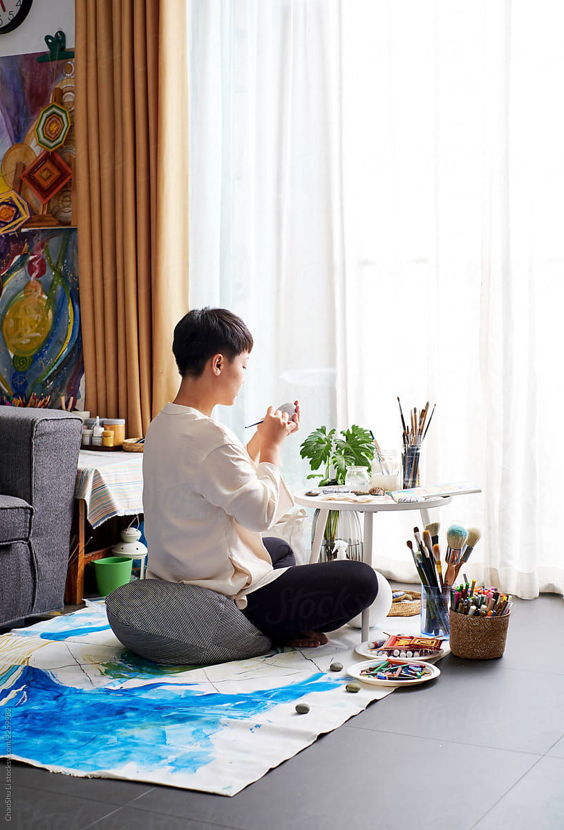 Asian woman painter, art painter. Work at home
