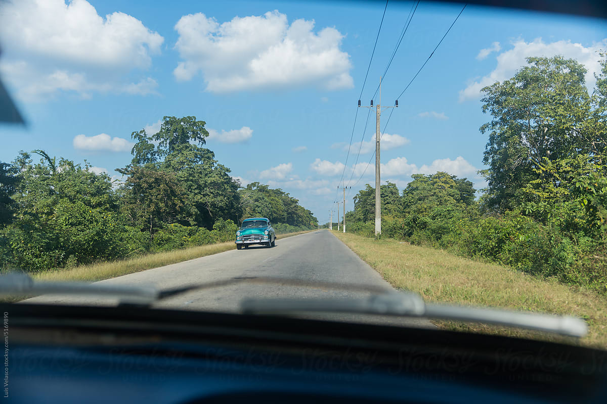 Old Style Car Drive On Cuban Freeway, Point Of View From The Car