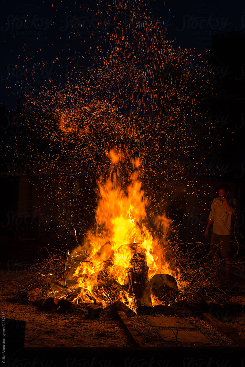large bonfire with sparks