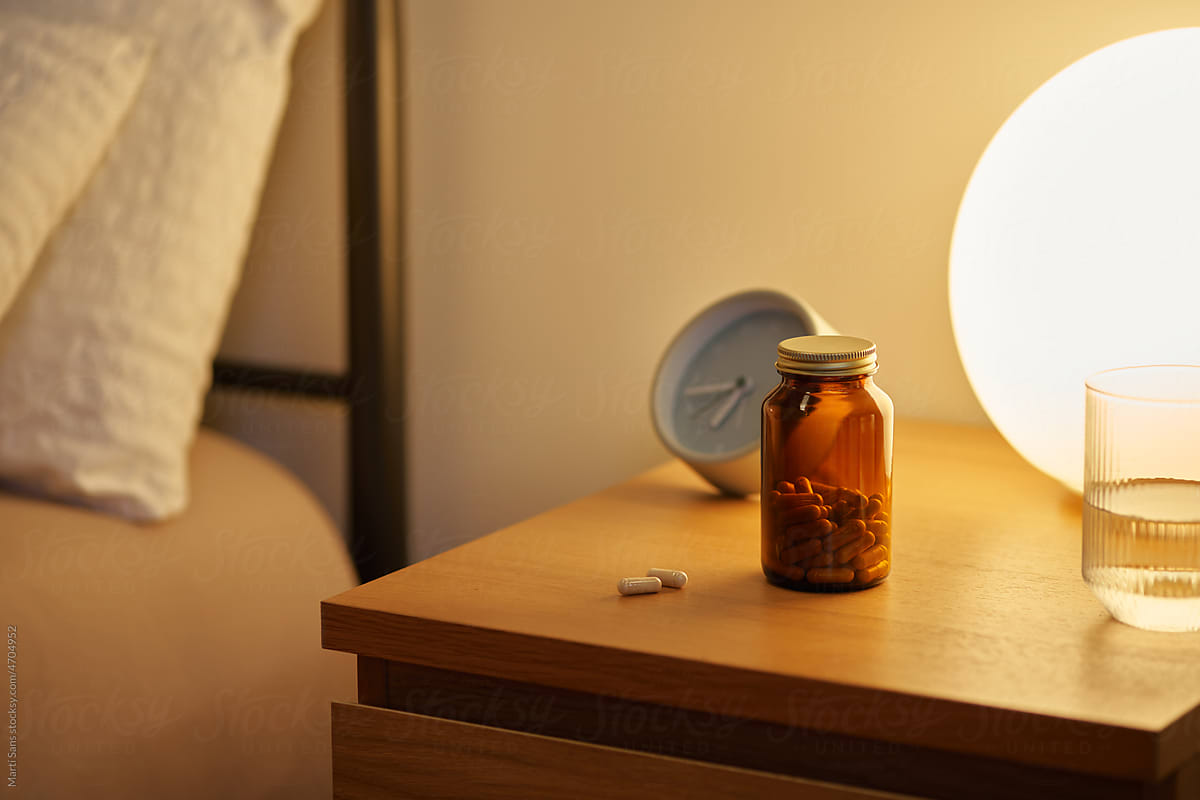 Capsules on bedside table.