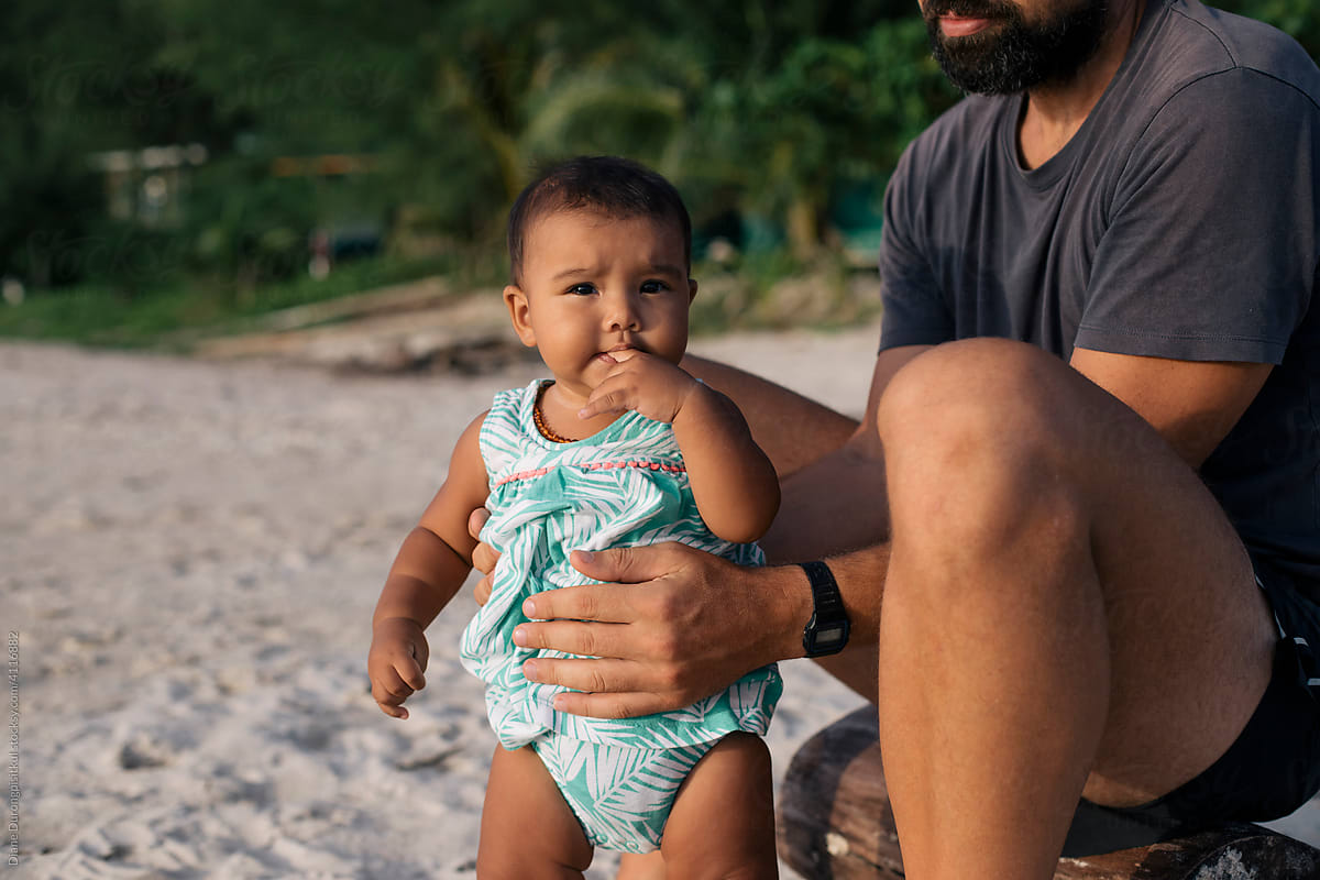 Baby Girl at Beach with Father