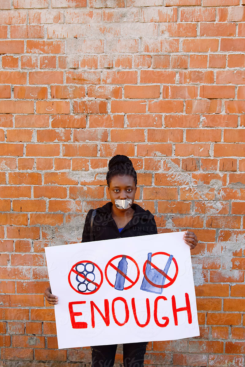 Mute black woman protesting against pollution