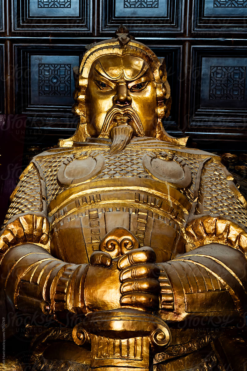 Golden Che Kung statue at a Buddhist temple in Hong Kong