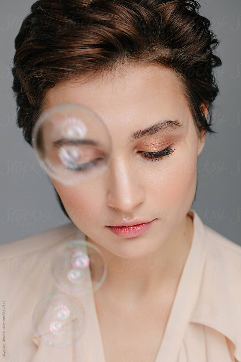 Beauty portrait with soap bubbles