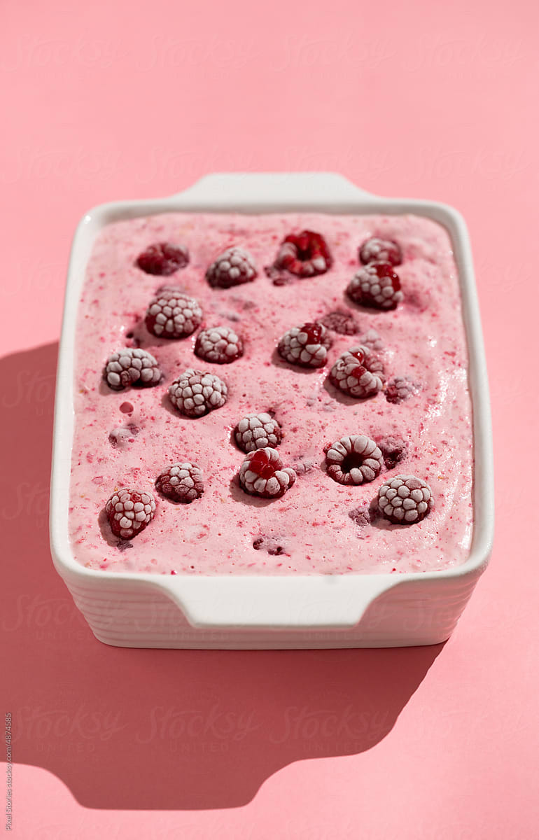 Homemade raspberry ice cream dessert in bowl