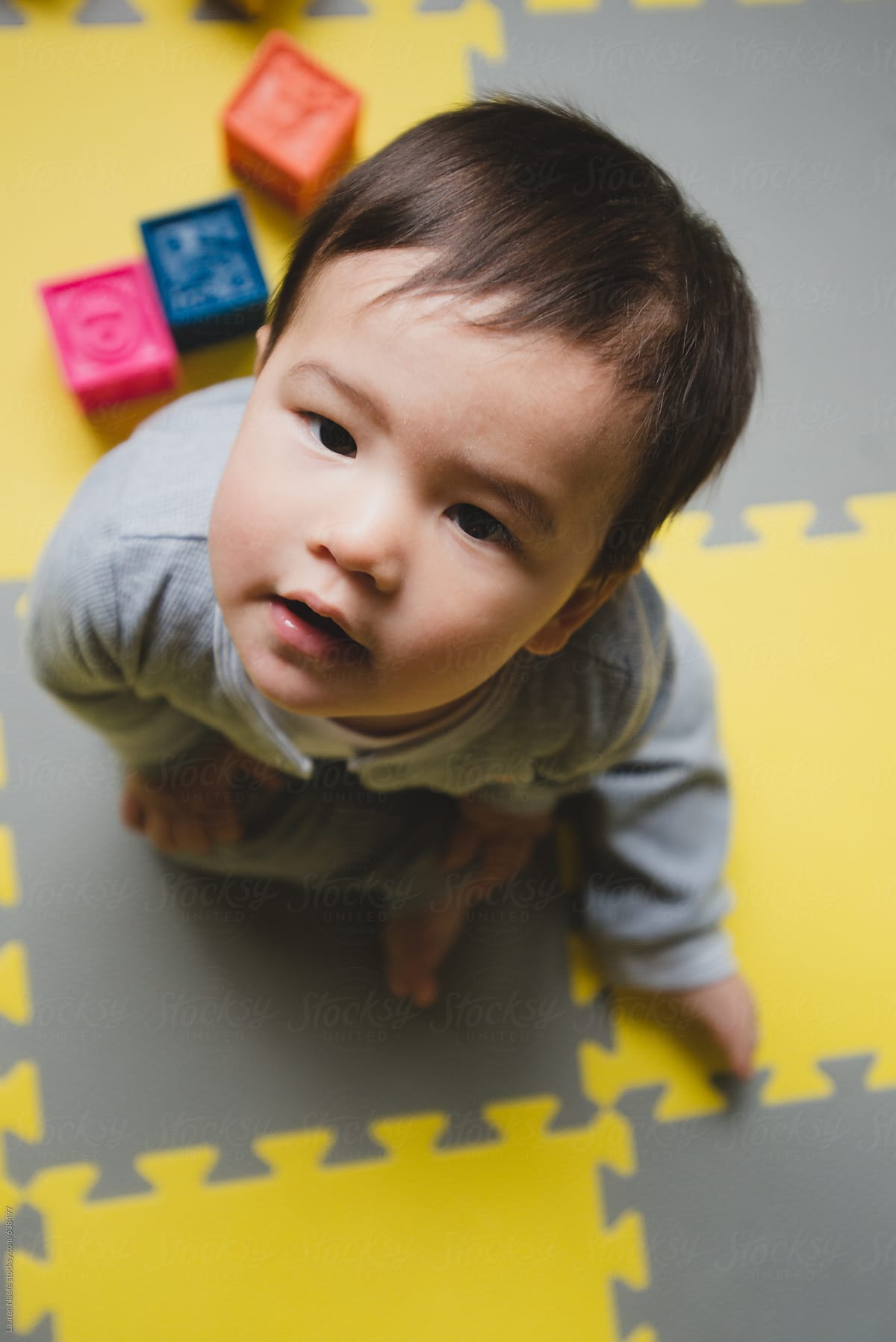 Baby on play mat