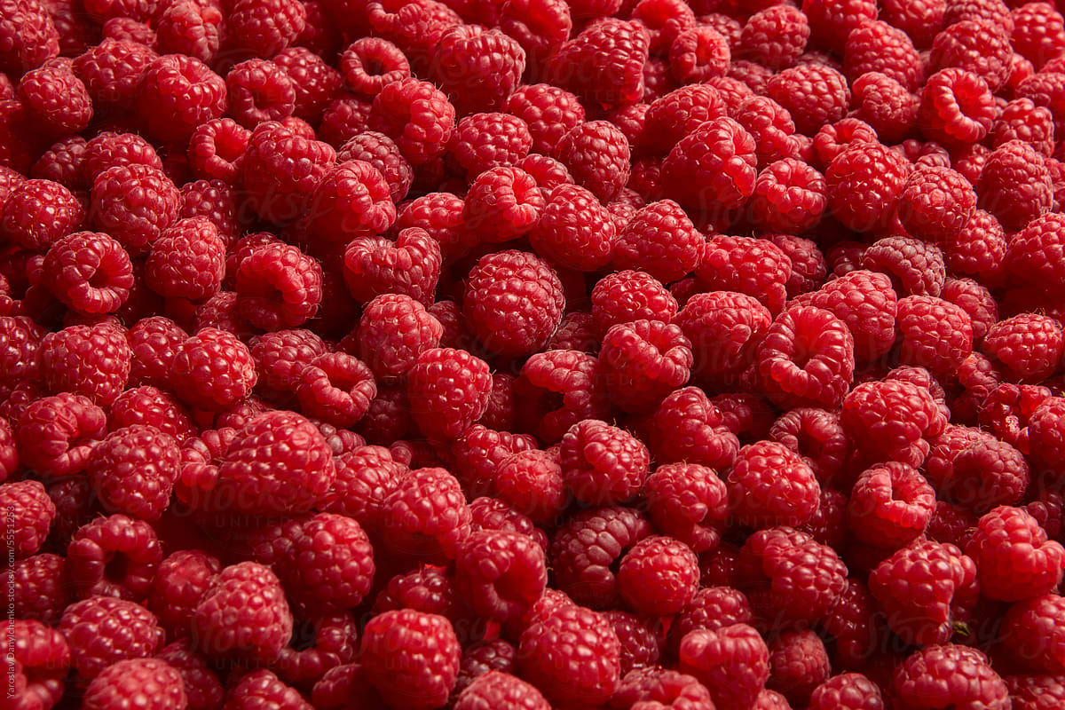 Natural raspberries, macro background with fresh fruit.
