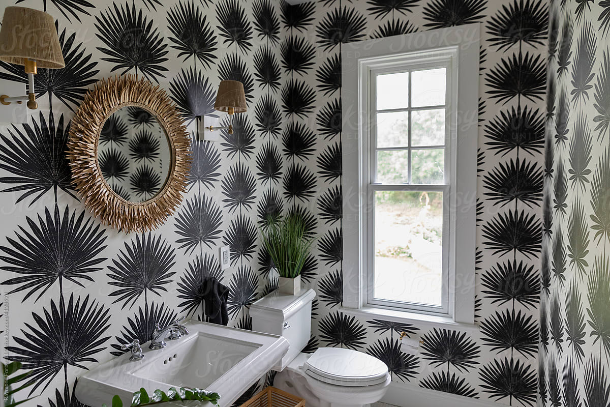 Stylish Bathroom in home with ornate Wallpaper