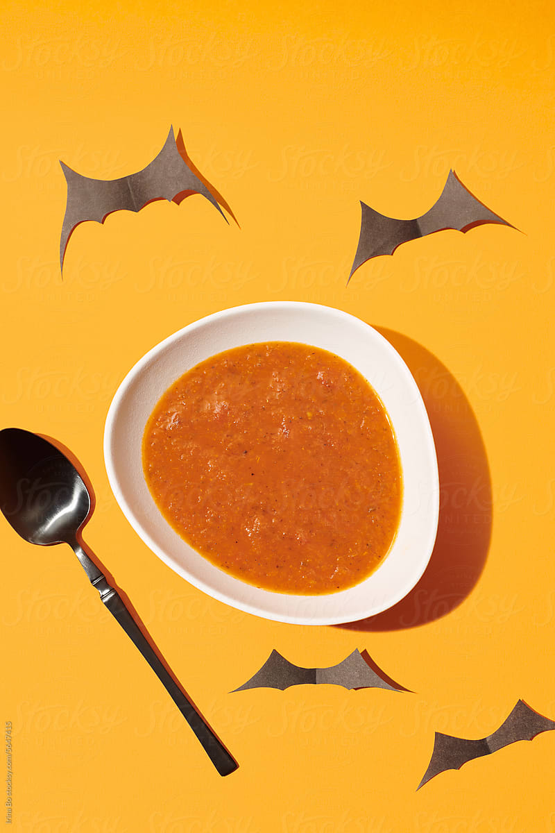 bowl of tomato soup decorated for Halloween