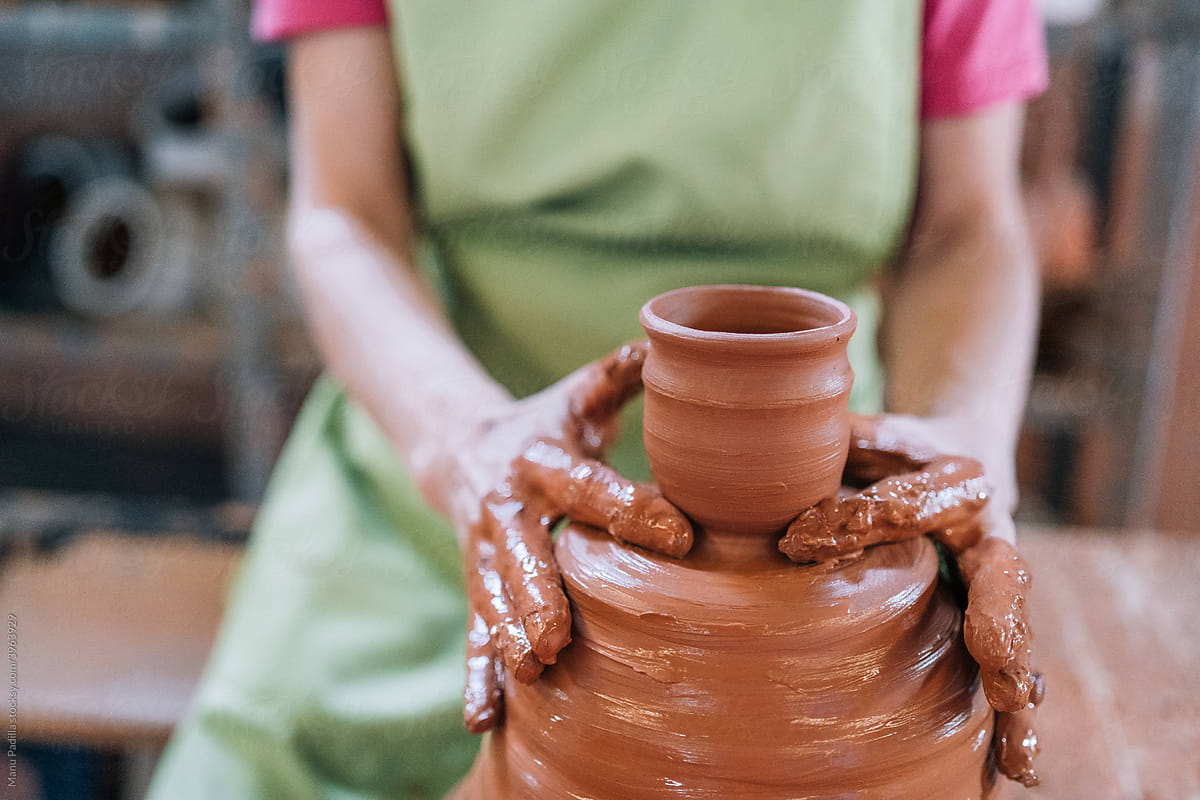 Woman Works in a Pottery Wheel
