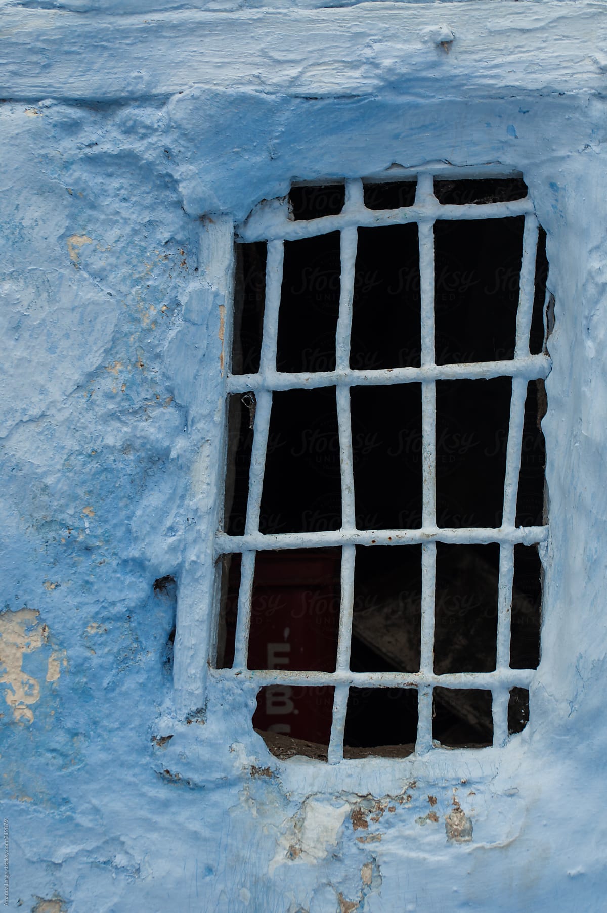 Chefchaouen blue city: barred window detail