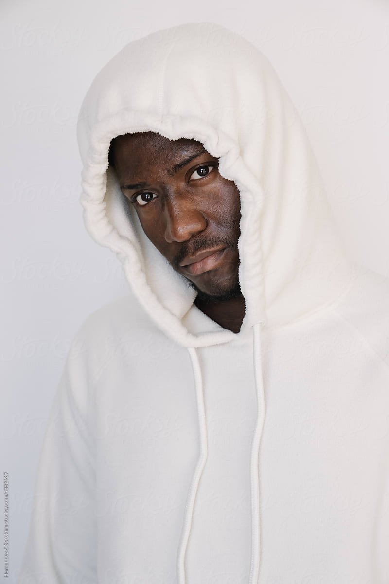 Studio Portrait Of Black Man Wearing Hoodie
