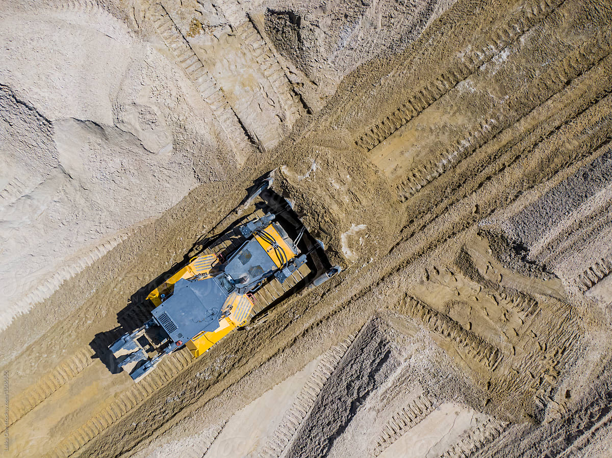 Aerial view of a bulldozer in a quarry
