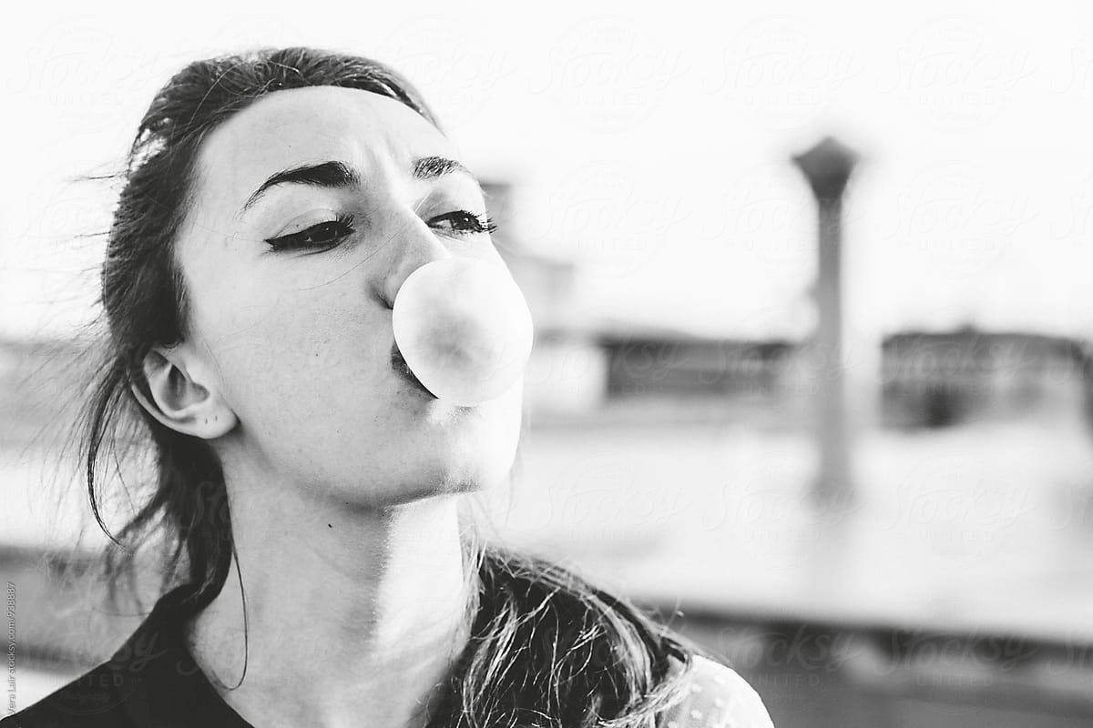Woman Blowing A Bubble Gum By Stocksy Contributor Vera Lair Stocksy 