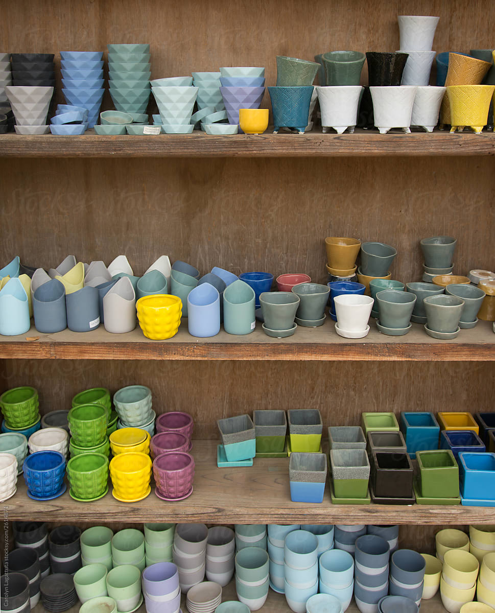 Shelves of colorful pottery
