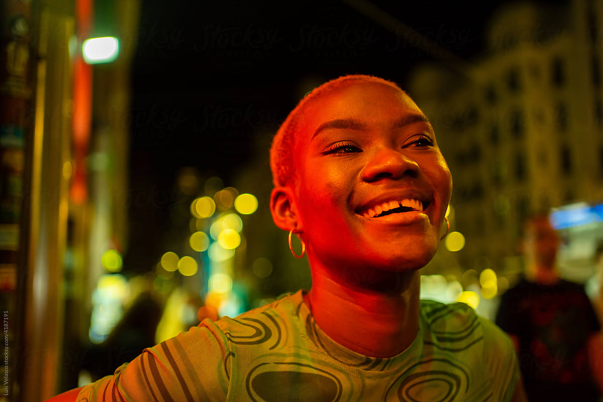 Portrait Of A Black Woman On The Street At Night.