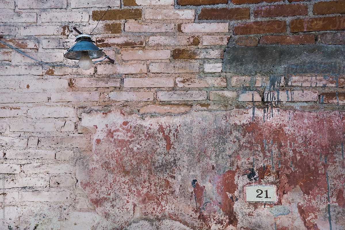 Background of brick wall with paint splatter