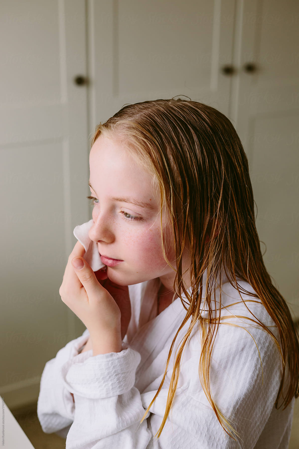 Preteen Girl Looking After Her Skin By Helen Rushbrook