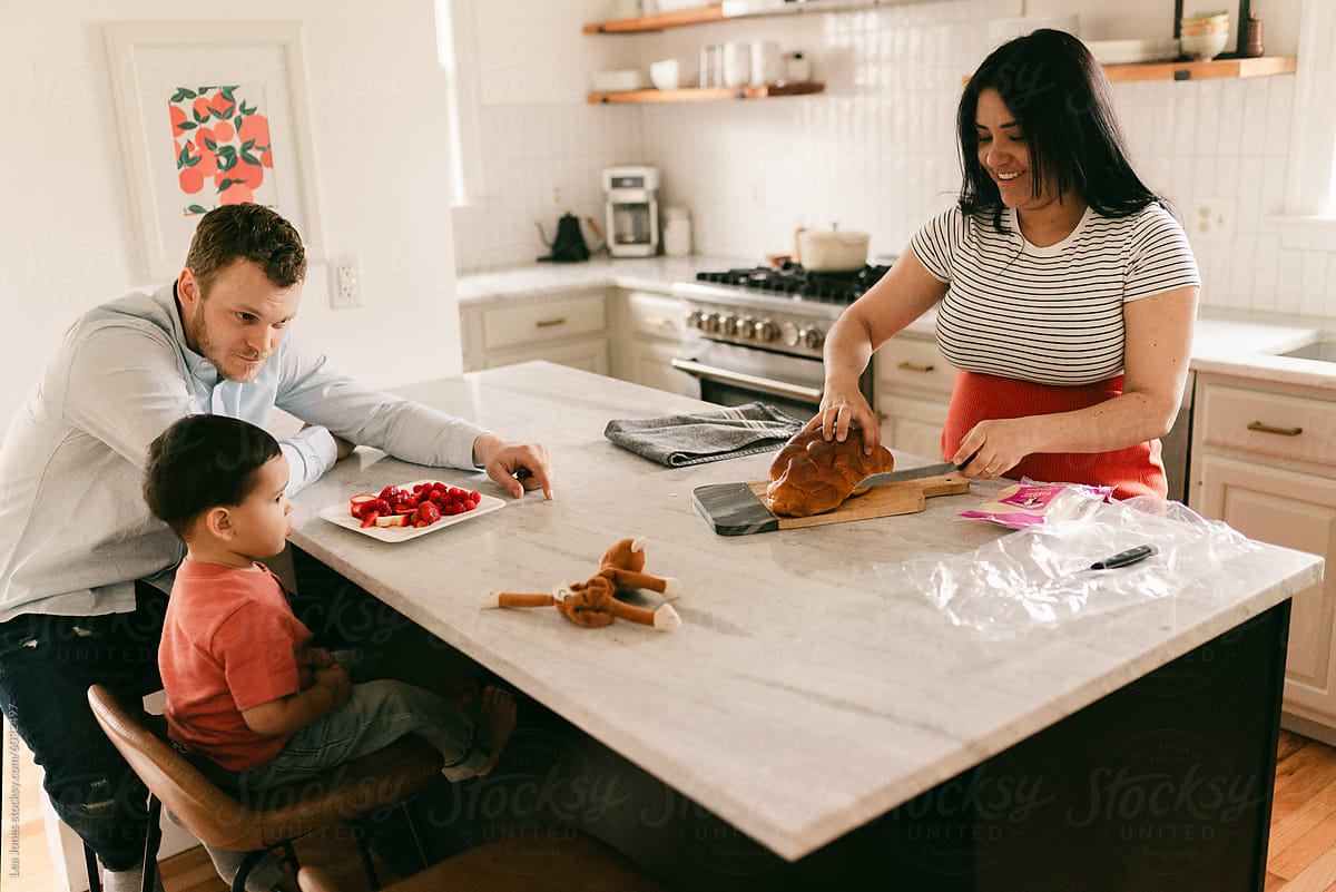 family with pregnant mother in kitchen