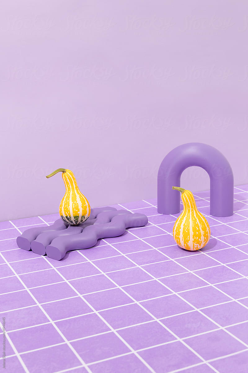 Yellow ornamental gourds with 3d objects and purple tiles.
