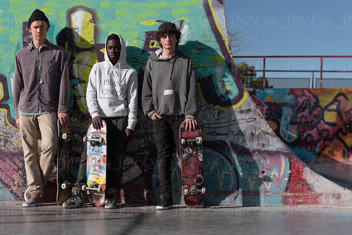 Friends standing in skatepark