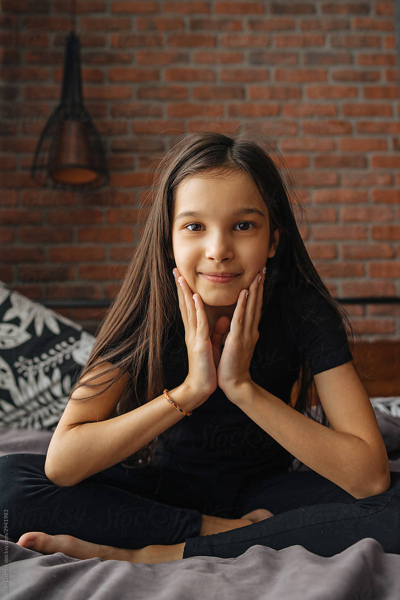 Portrait Of 11 Year Old Dark Haired Girl By Stocksy Contributor Ivan