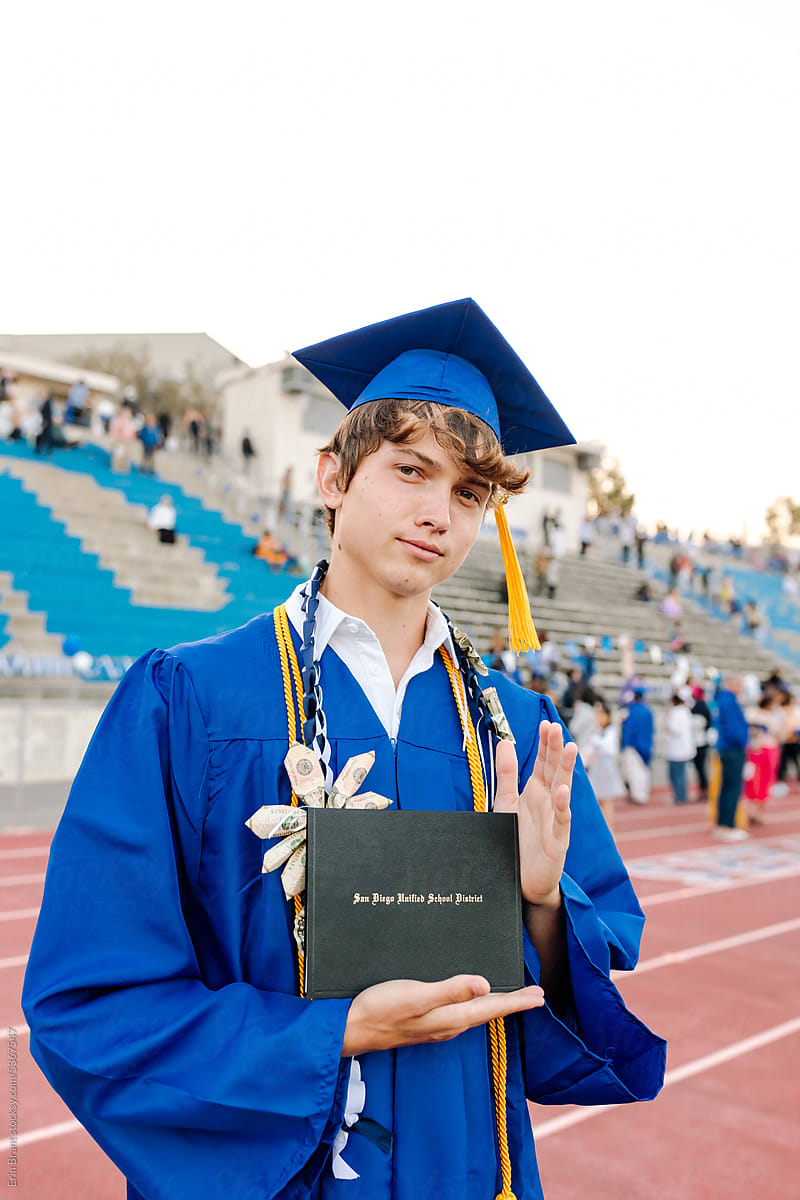 Portrait of grad with diploma