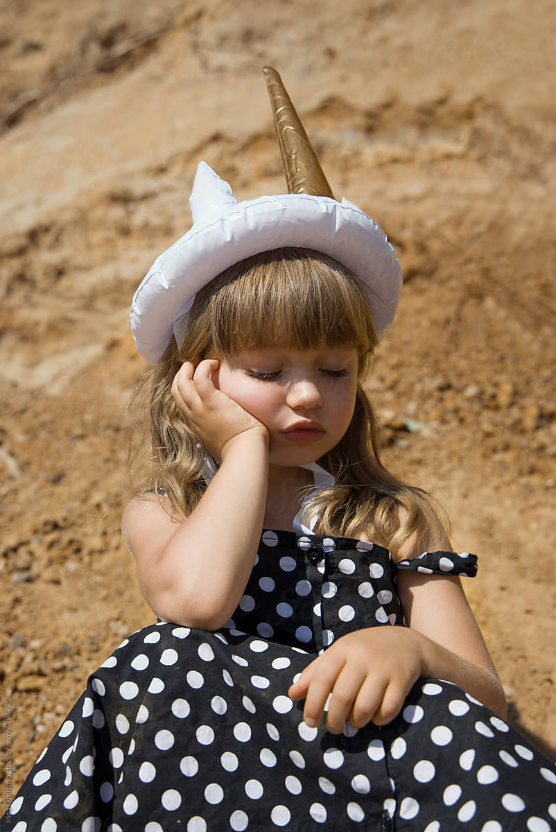 Cute sad little girl outdoor