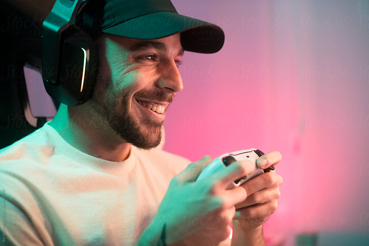 Smiling console gamer having fun