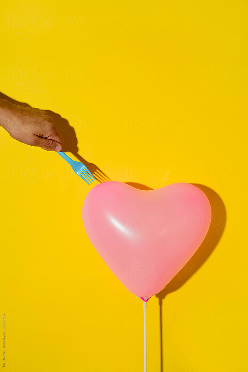 Deflated Heart-shapped Balloon by Stocksy Contributor Juan Moyano -  Stocksy