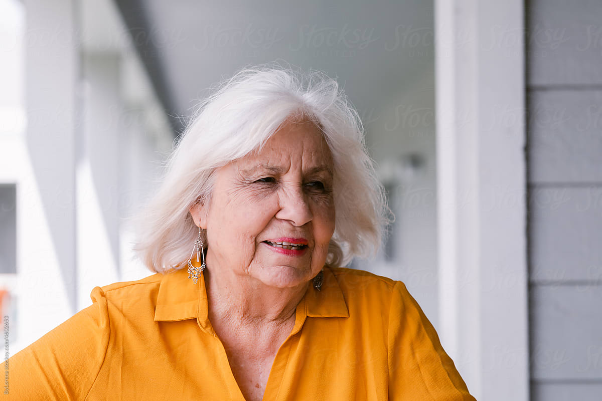 Lively white hair senior woman at retirement residence portrait
