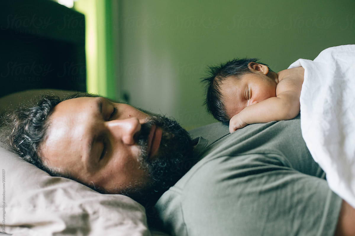 Baby and Father sleeping