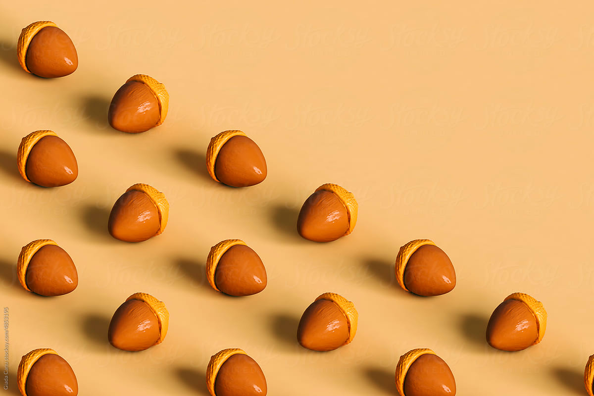 3d acorns on yellow background