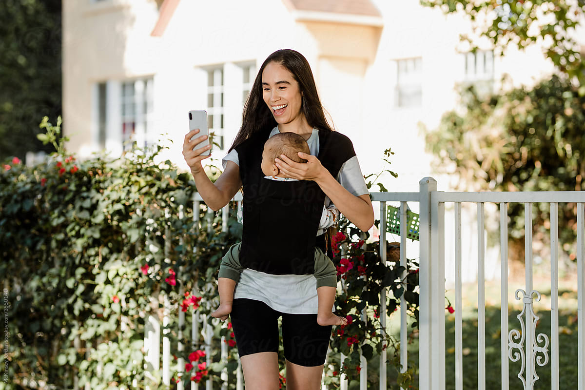 Mother Video Chats While on a Walk with Baby