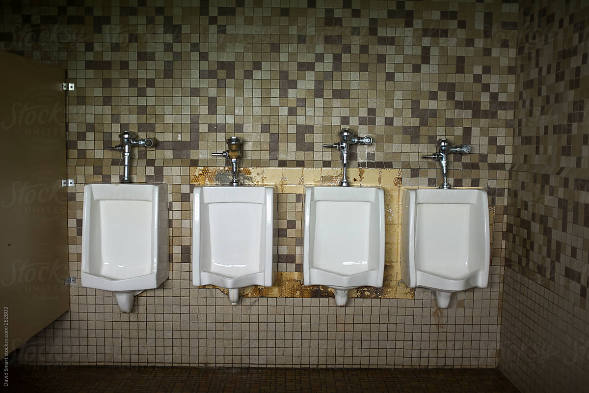 Men\'s urinals in public restroom