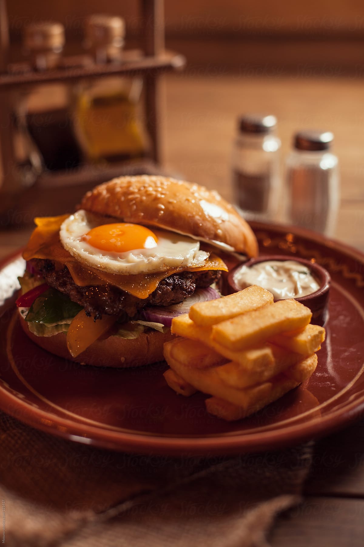 Texas Burger With Egg and French Fries