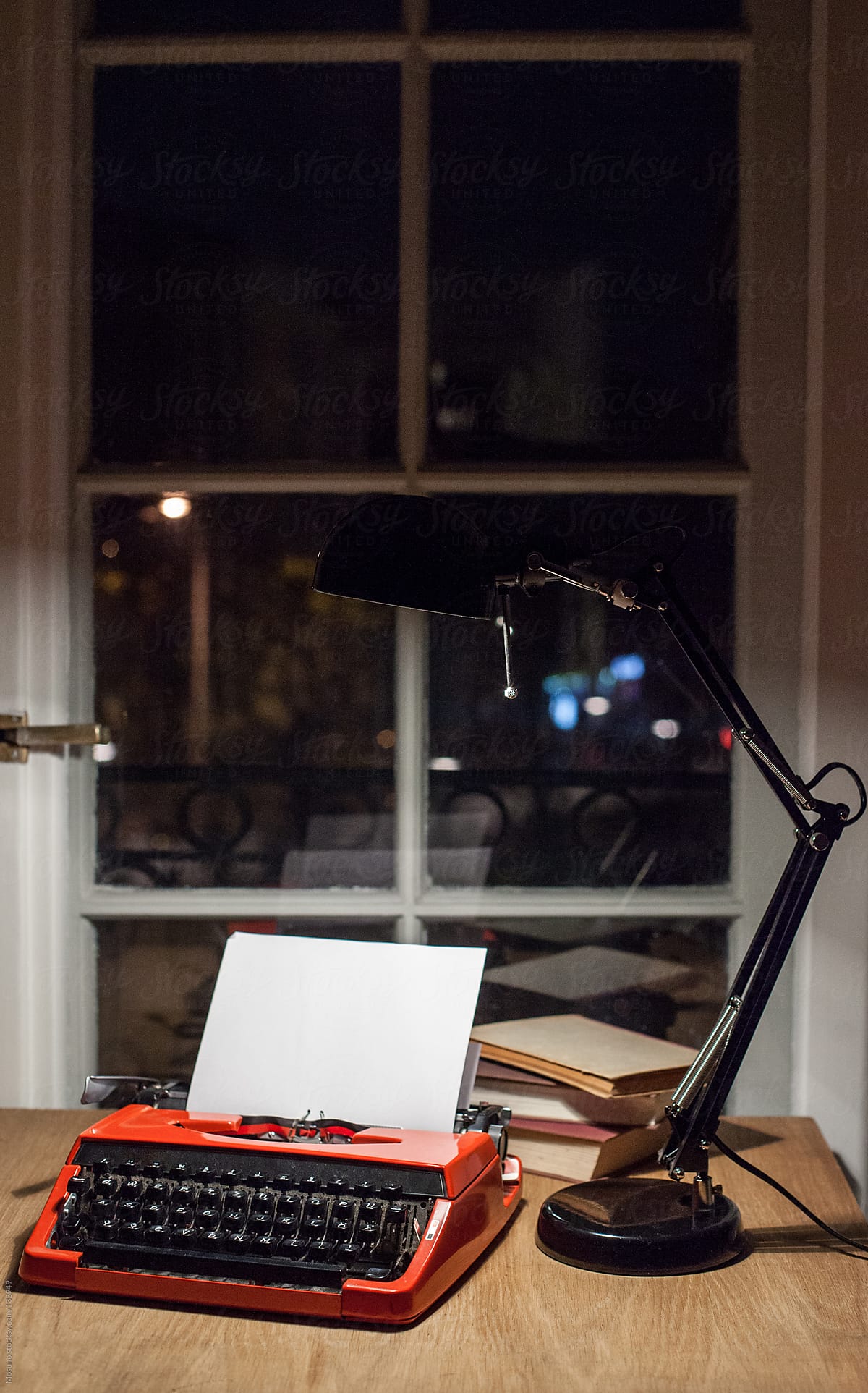 Typewriter on a desk.